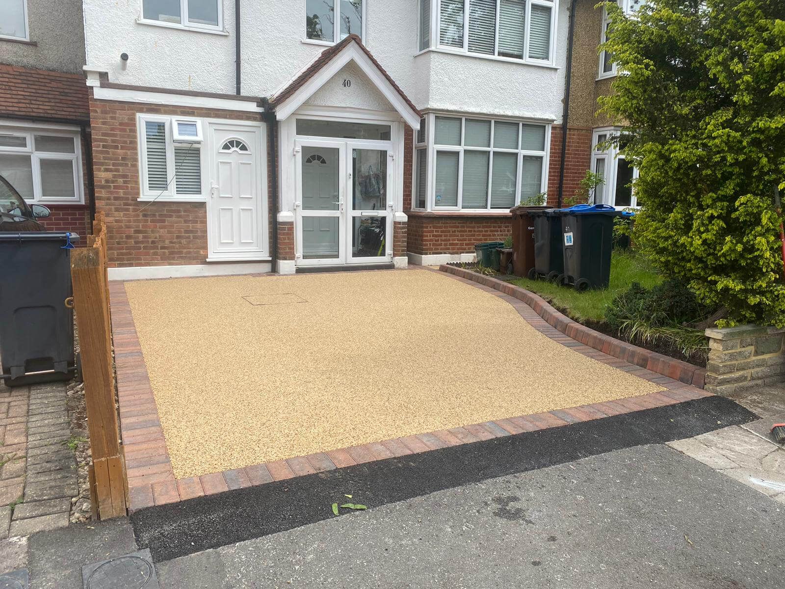 Completed resin driveway in front of a home